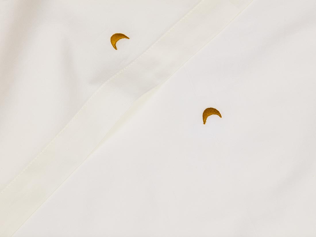 Image of Yumeko Kinderlaken katoen satijn warm white/ochre moon 100% biologisch en fairtrade katoen
