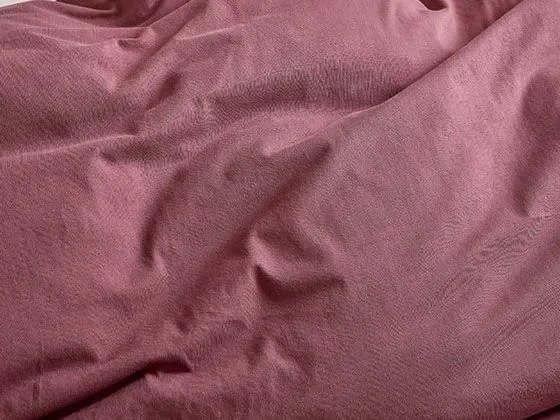 Close-up van jersey katoen in evening rose