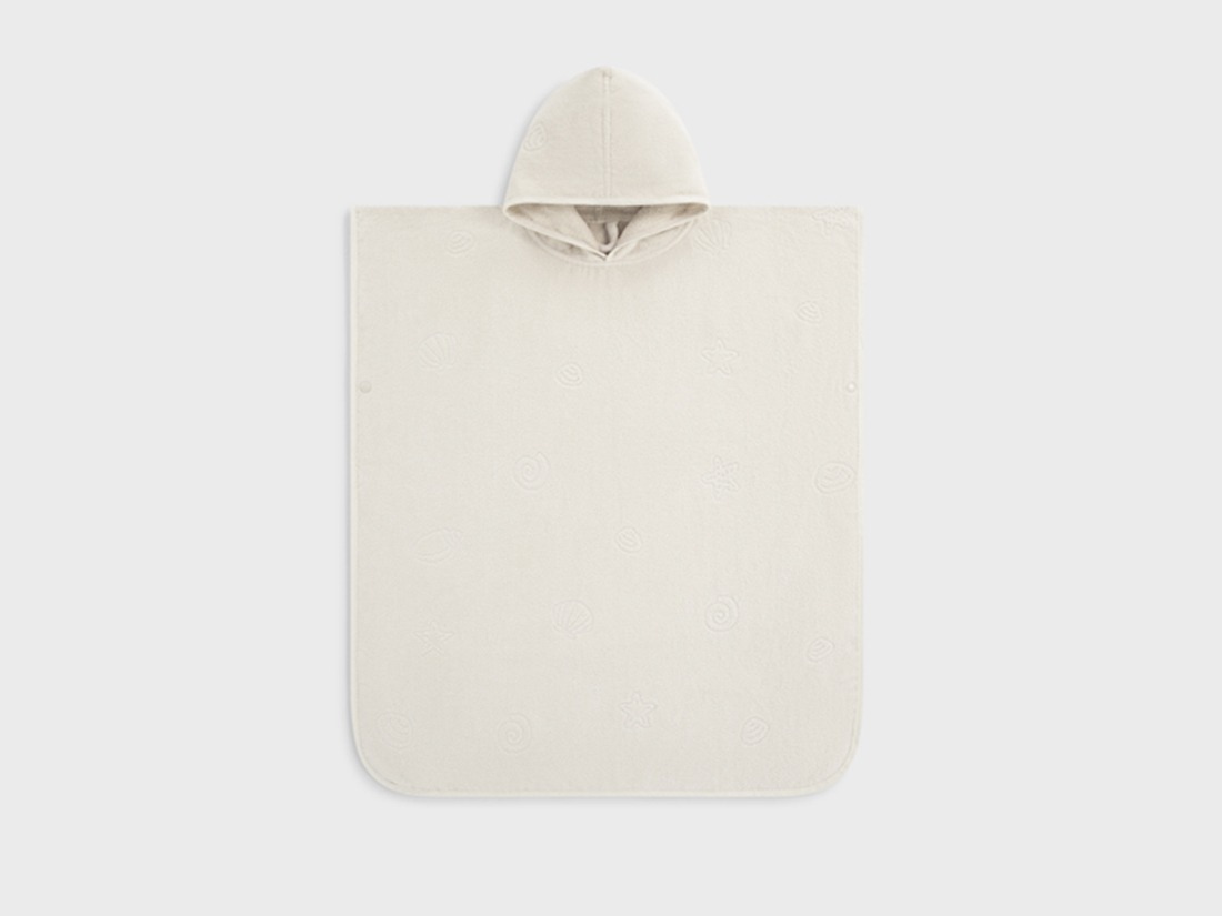 Badponcho til børn i velour seashell soft sand