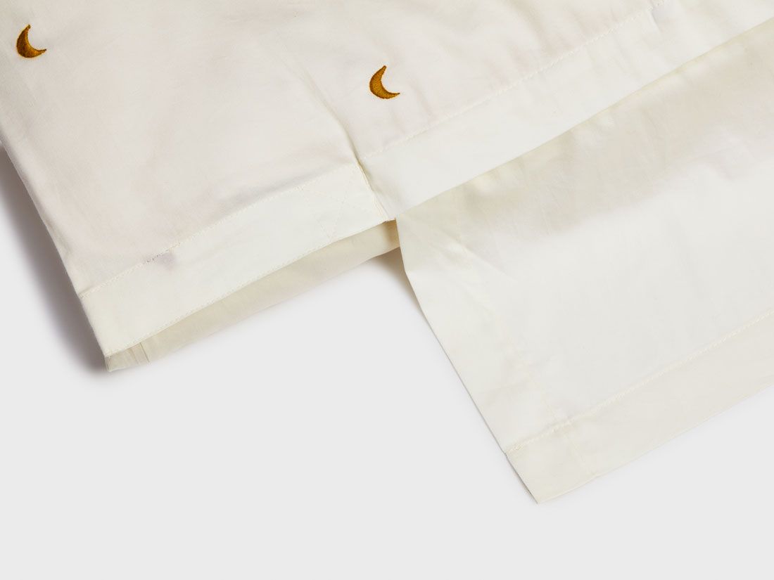 Juniordynebetræk bomuldssatin warm white/ochre moon