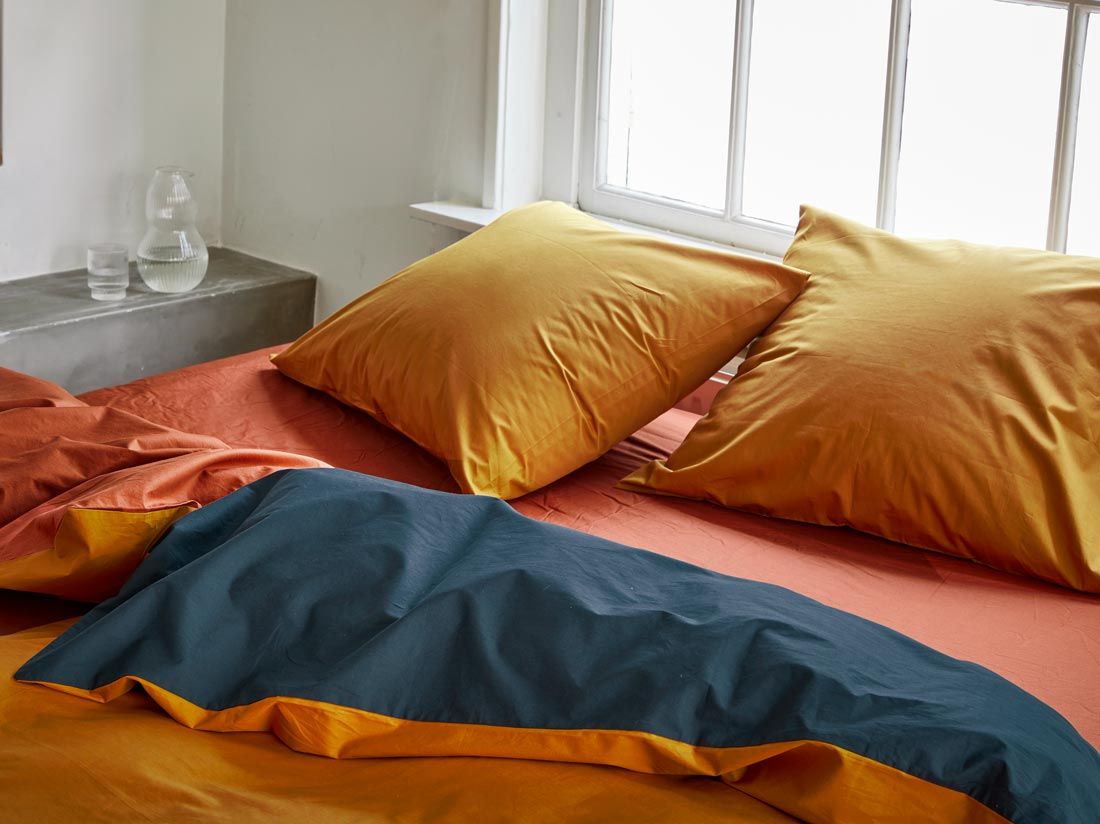 Dekbedovertrek percal katoen double face ochre/navy