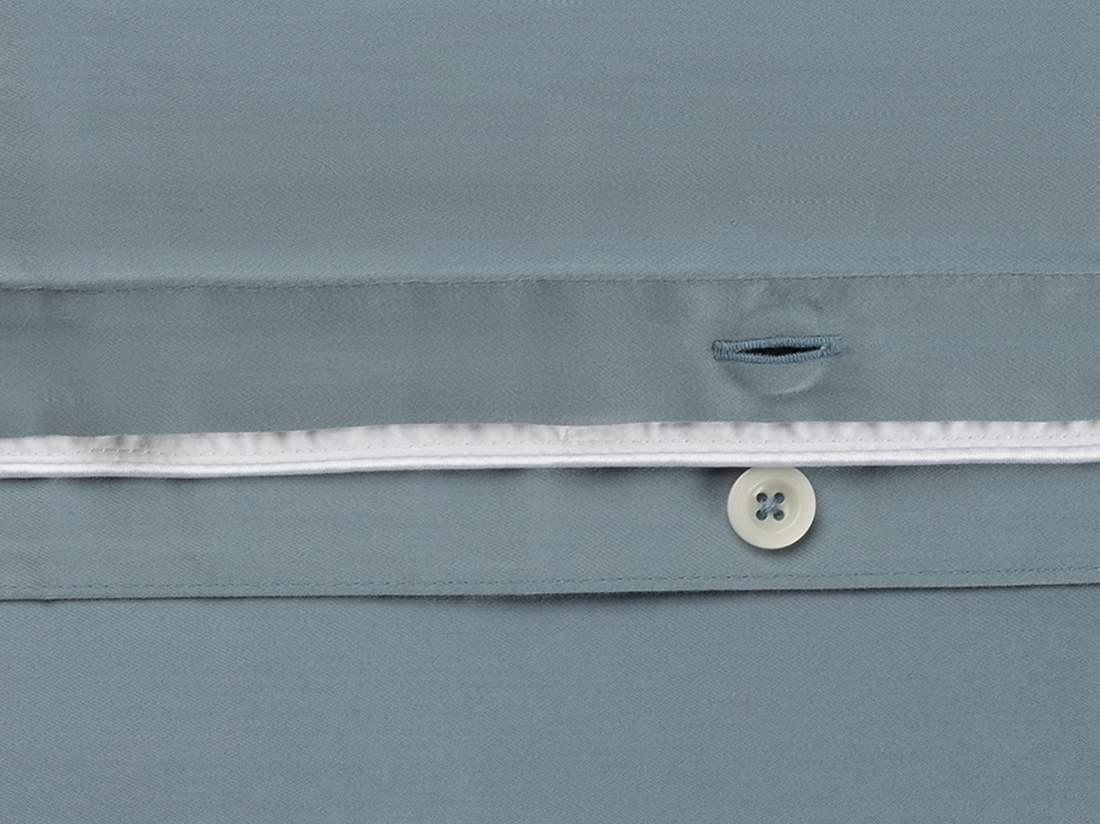 Påslakanset bomullssatin faded blue