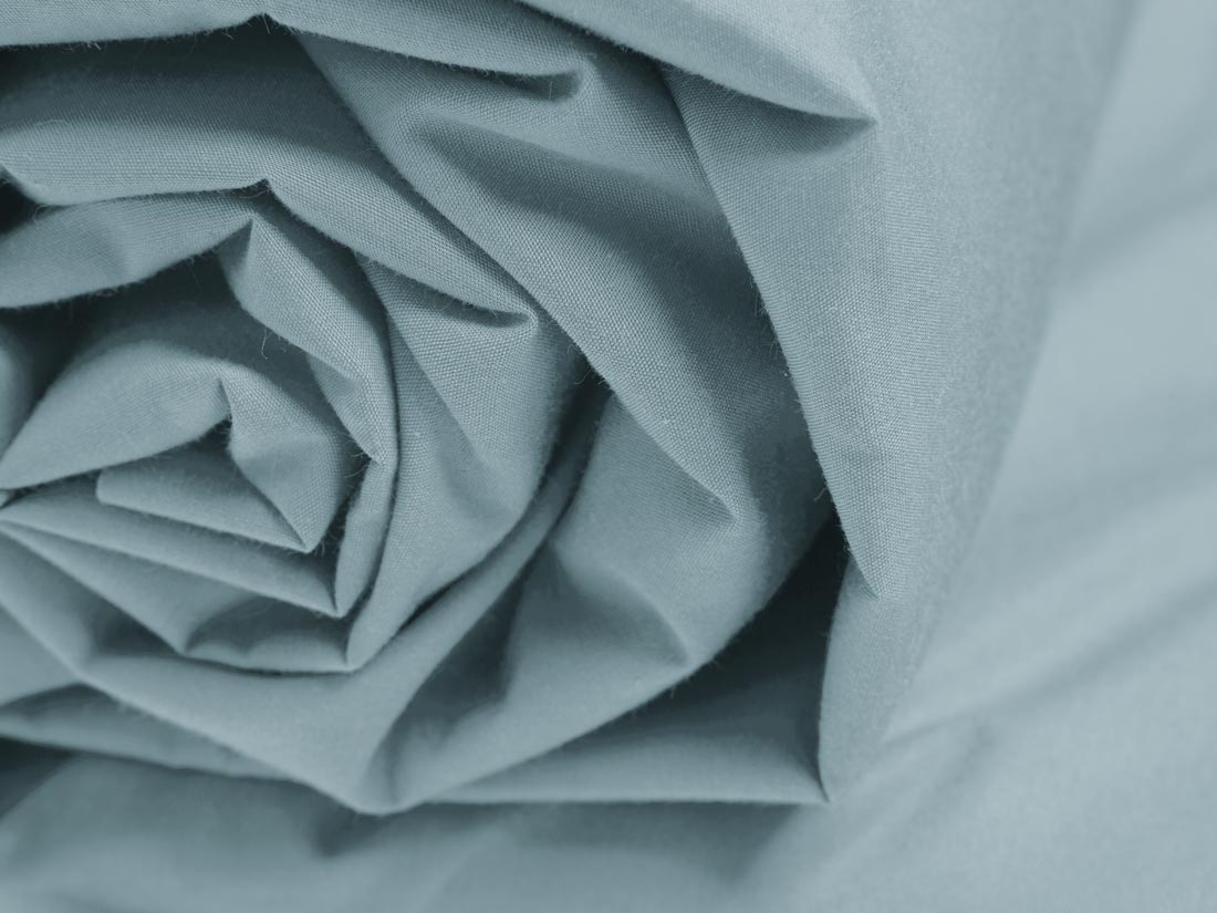 Faconlagen percale petrol blue