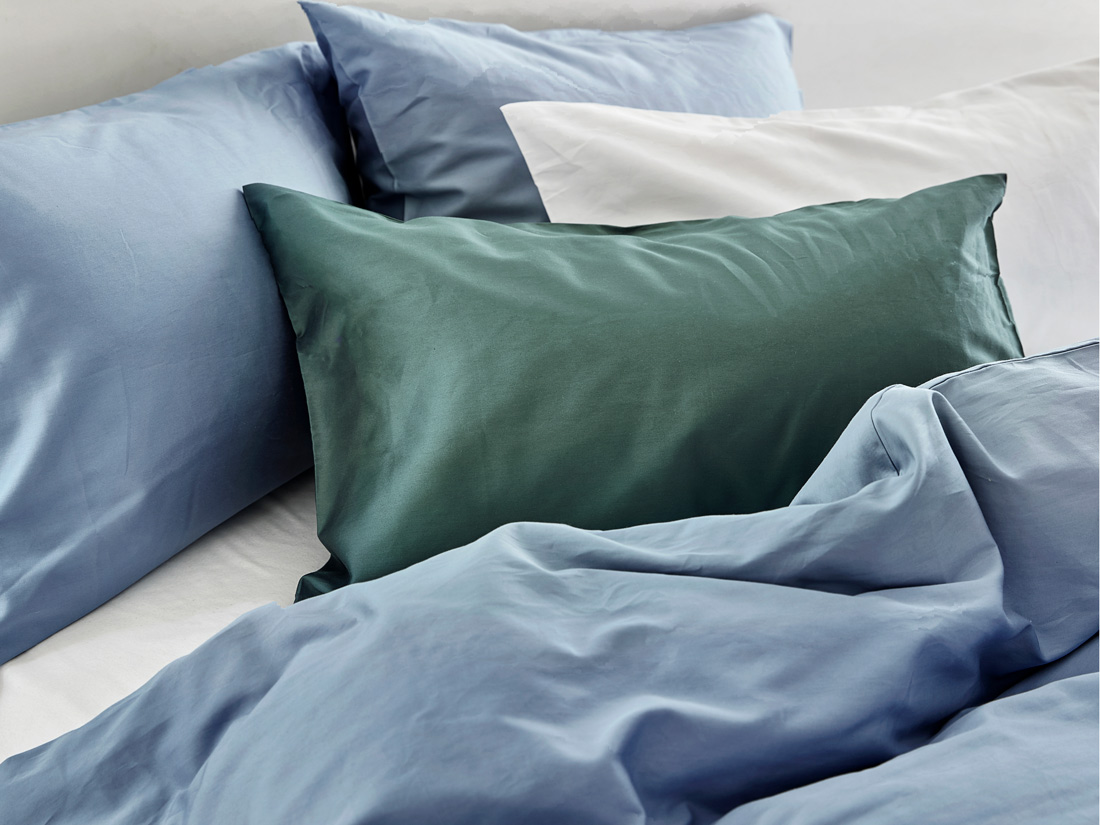 Påslakanset bomullssatin faded blue