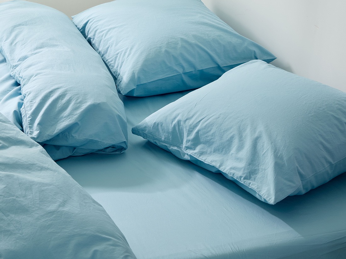 Taie d'oreiller percale de coton bleu lagon